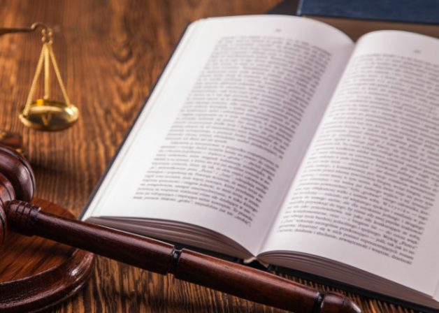 Mallet, legal code and scales of justice. Law concept, studio shots