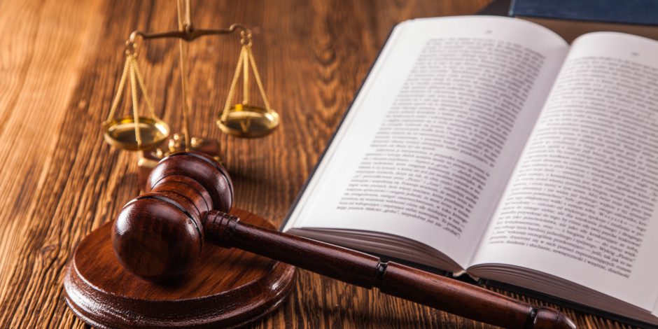 Mallet, legal code and scales of justice. Law concept, studio shots