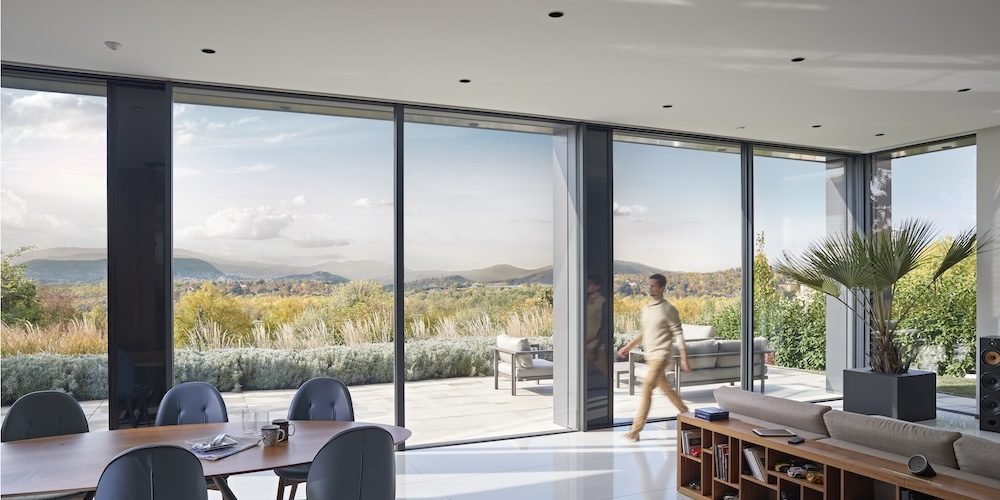 Schuco-aluminium-keret-nelkuli-toloajto-frameless-slide-door-porsche-design-PD77-minimal-house-interior-nappali-belter