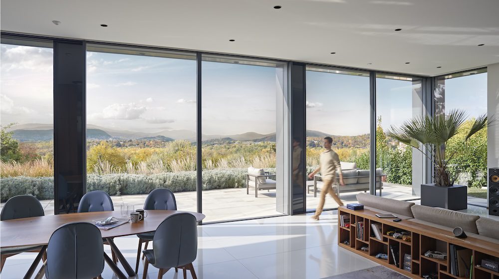 Schuco-aluminium-keret-nelkuli-toloajto-frameless-slide-door-porsche-design-PD77-minimal-house-interior-nappali-belter