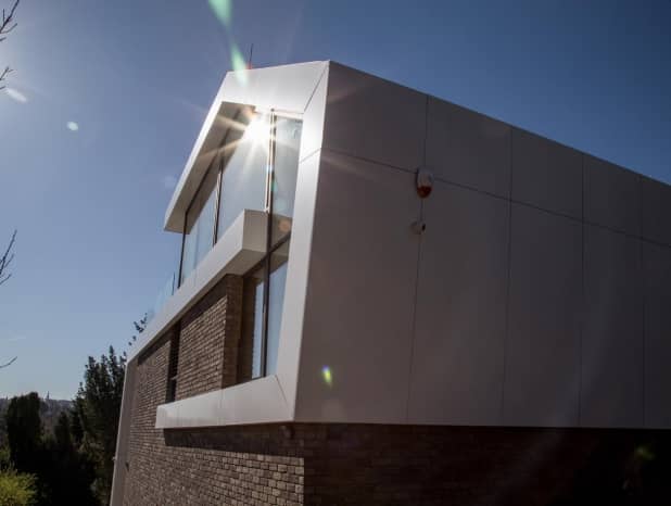 Szoborszerű, kortárs családi ház