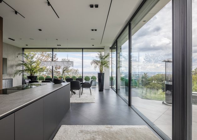 Reynaers-hifinity-minimal-interior-kitchen-glass-frame-sliding-door-luxury