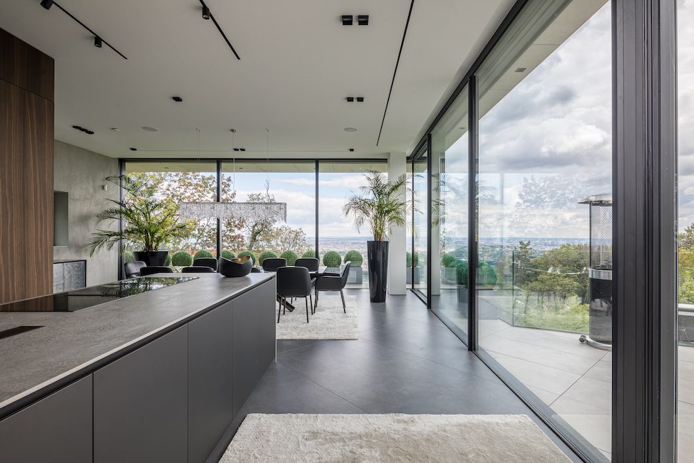 Reynaers-hifinity-minimal-interior-kitchen-glass-frame-sliding-door-luxury